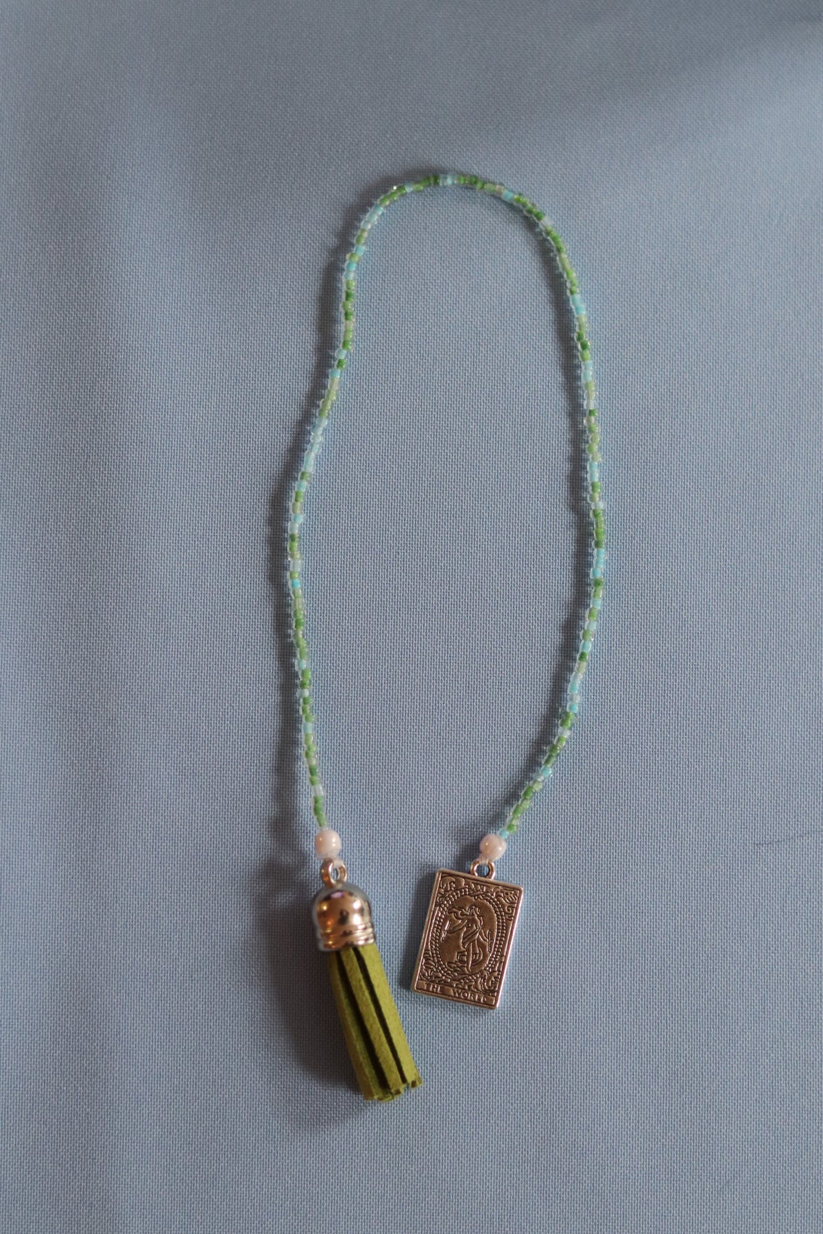 The world Beaded Book Mark