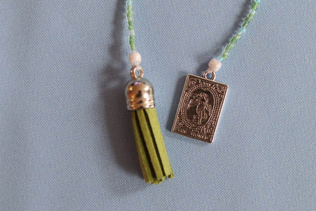 The world Beaded Book Mark